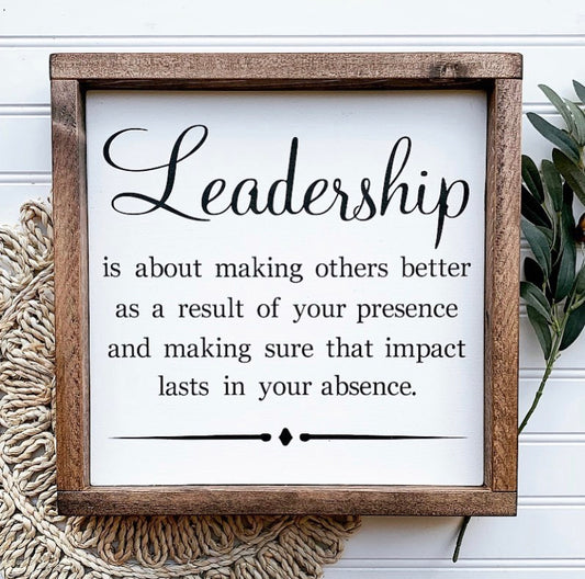 Leadership is about making others better as a result of your presence and making sure that impact lasts in your absence.  Framed Wood Sign.  Retirement or boss gift.