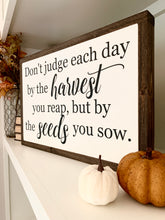 Load image into Gallery viewer, Don&#39;t Judge Each Day By The Harvest You Reap, But By The Seeds You Sow Framed Wood Sign
