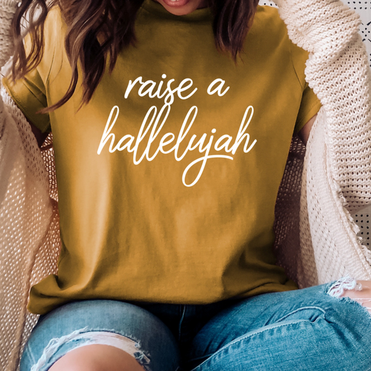 raise a hallelujah graphic scripture design on short sleeve mustard color tee shirt